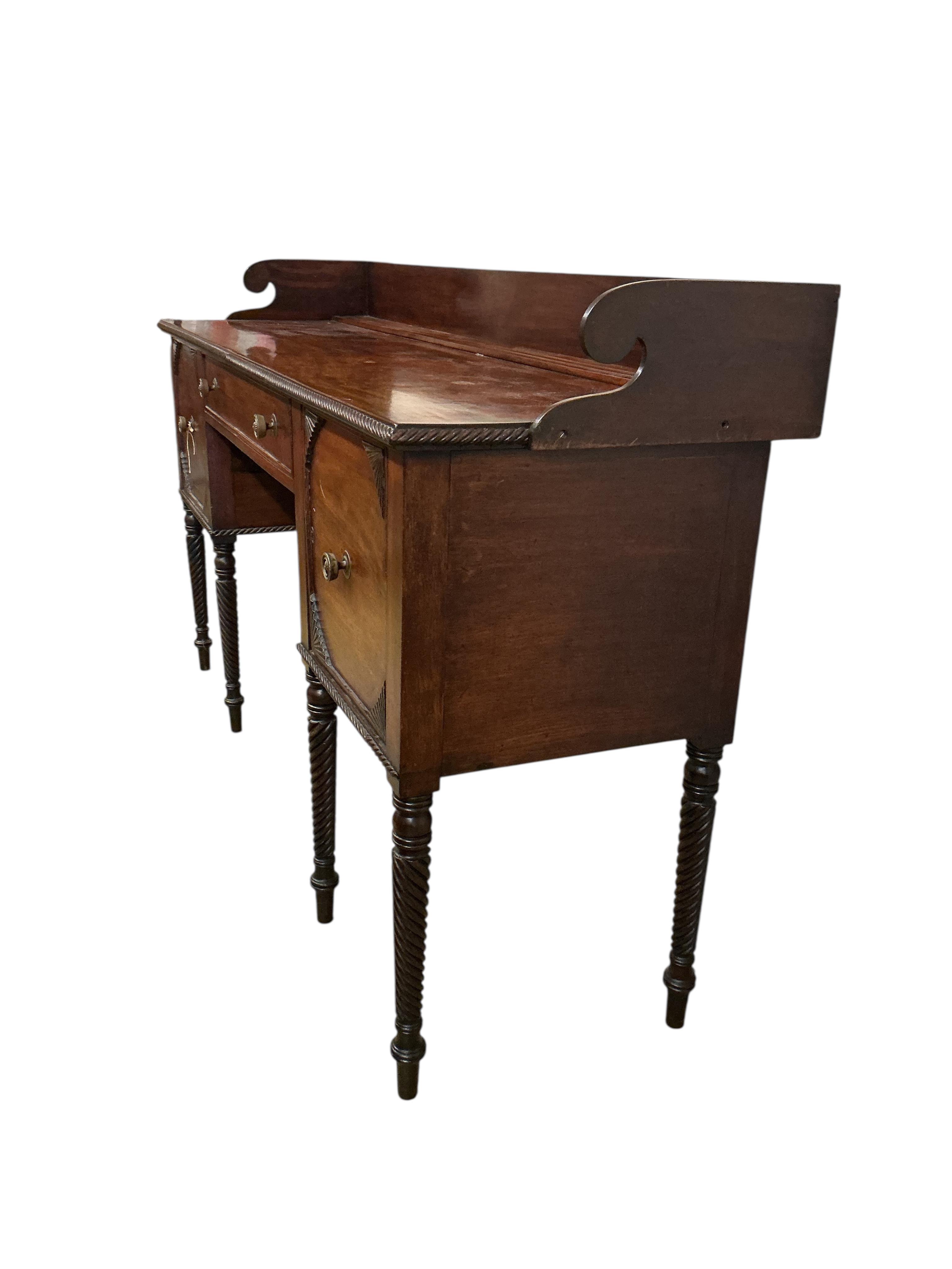 A Regency Scottish mahogany sideboard, width 180cm, depth 55cm, height 106cm